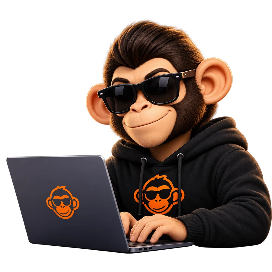 The Builder Monkey mascot in sunglasses and a black hoodie, typing on a laptop